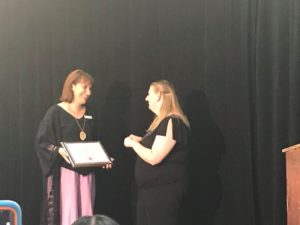Barbara Beckert receiving award from WAD conference representative