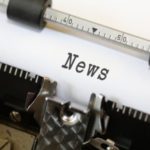 Closeup of the word "News" in an old typewriter