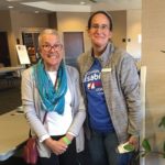 Member of League of Women Voters and Disability Vote Coalition standing together