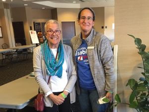 Member of League of Women Voters and Disability Vote Coalition standing together